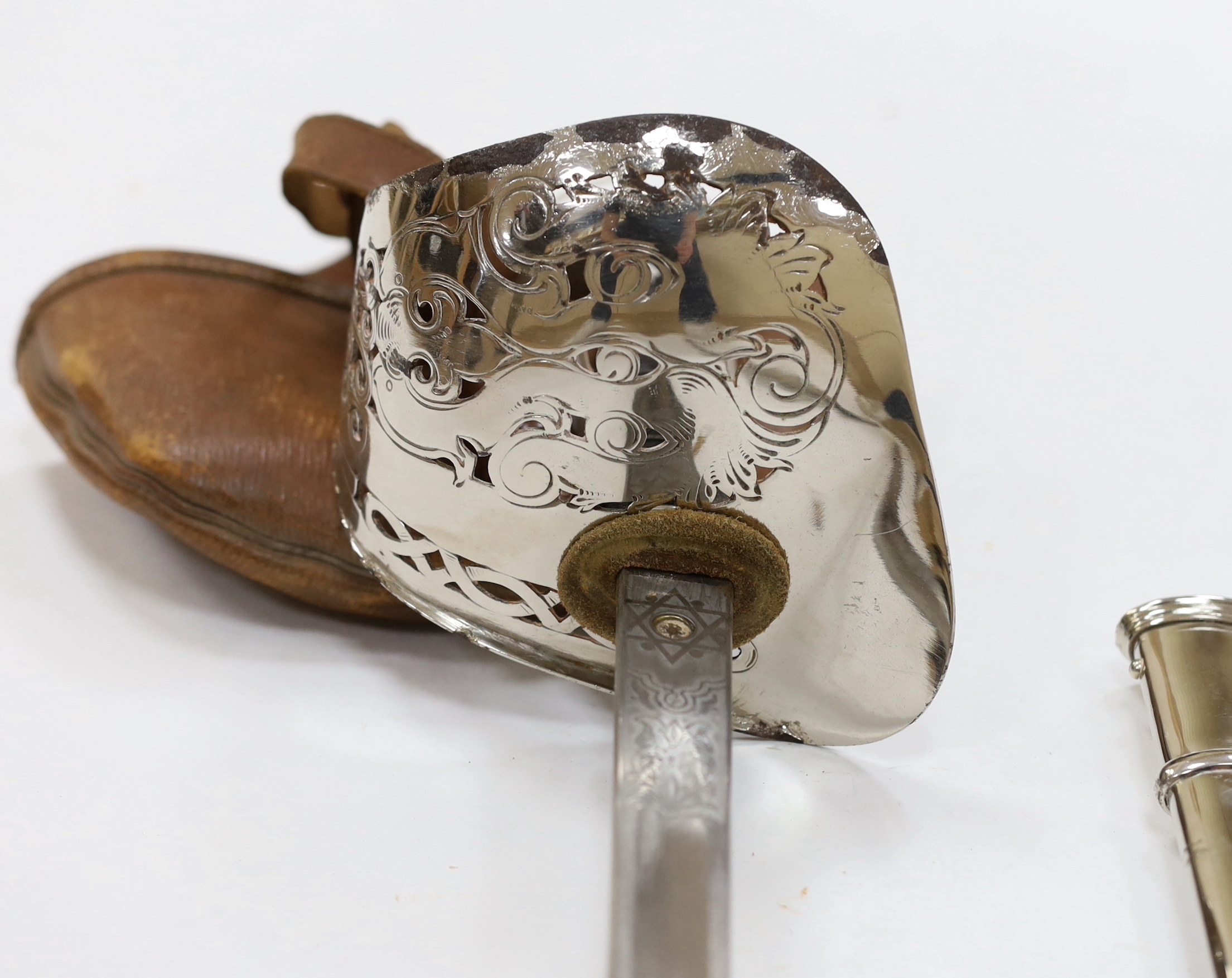 A George V officer's sword, maker Hawksworth Sheffield, in chromed scabbard, blade 82cm